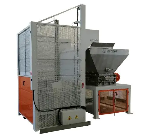 Shredding of PTFE scraps and shavings Shredding of PTFE scraps and shavings